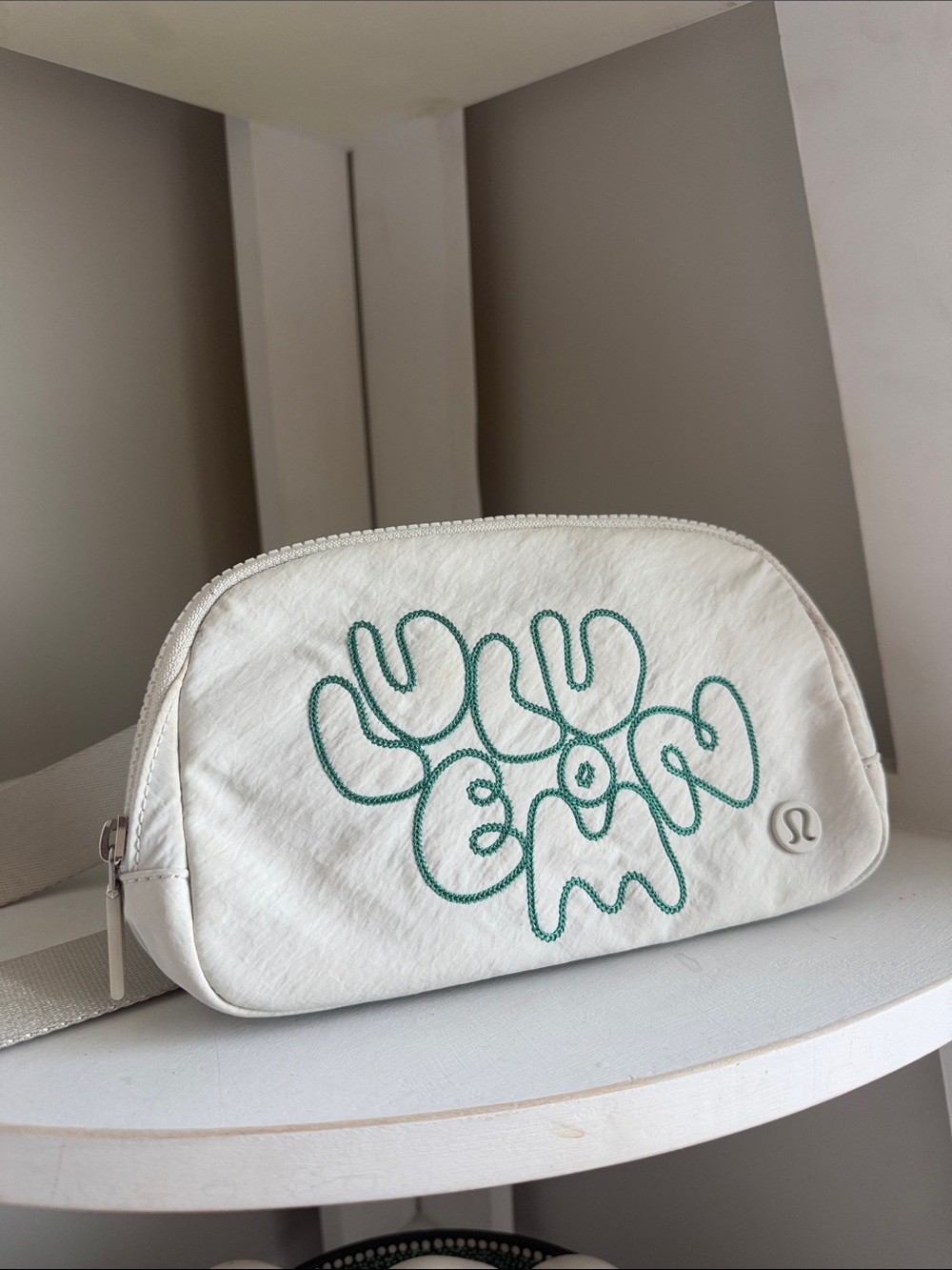 lululemon athletica White Crossbody Bag with Teal Embroidered Motif